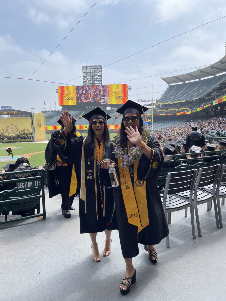 AAAS students waving at Commencement 2023     