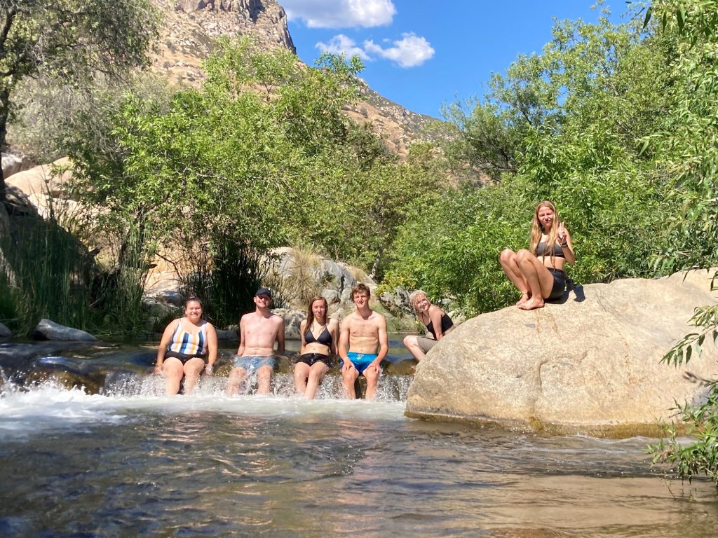 Students relaxing in the main fork of the Tule River