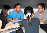 students consulting each other