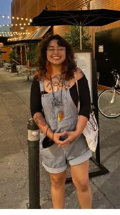 Samantha Olvera standing on the street smiling