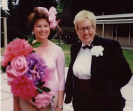Sharon Sievers next to woman in pink dress