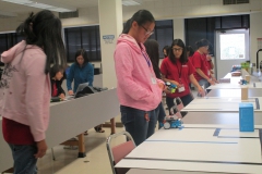 EGI Interns testing out their robots before the contest