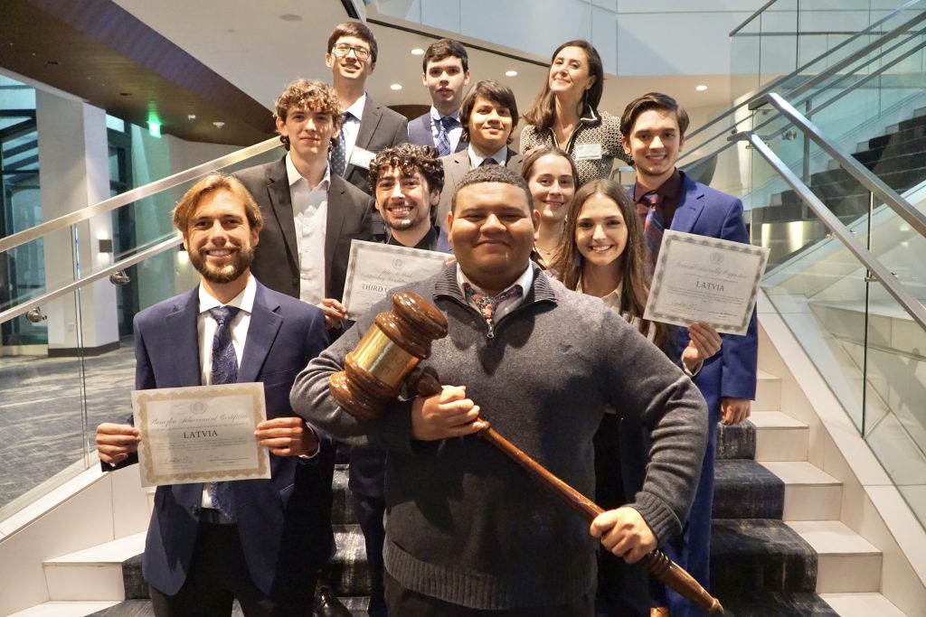 Delegates pose with their awards at the 2023 Model United Nations of the Far West Conference in San Francisco, CA. Top to bottom, left to right: Matthew Wong, Ethan Bray, Dr. Ezgi Yildiz, Evan Stein, Dennis Brownlee, Blake Maese, Sarah Arya, Grant Latour, Kyle Smith, Joshua Mims, Mikayla Browne